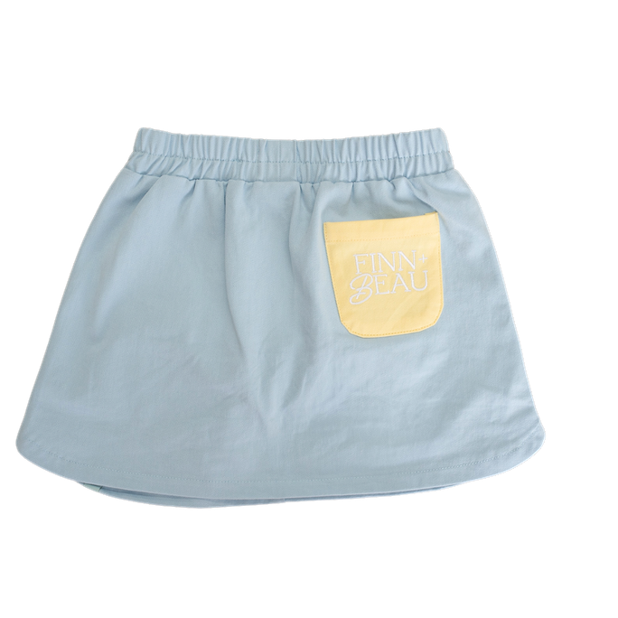 Light blue skirt with a yellow pocket on a white background