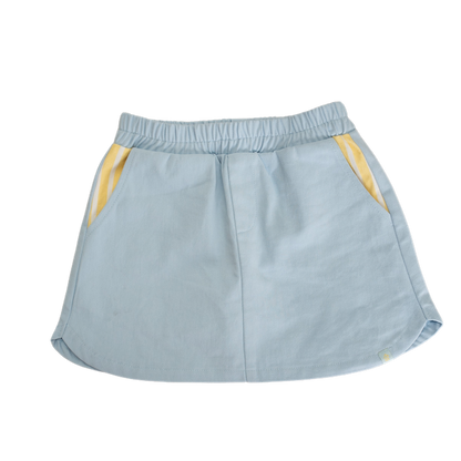 Light blue skirt with yellow accents on a white background